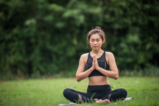 istock Yoga action exercise healthy in the park 1152984391