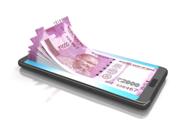 New Indian Currency on mobile stock photo