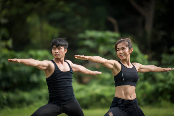 istock Yoga action exercise healthy in the park 1152984657