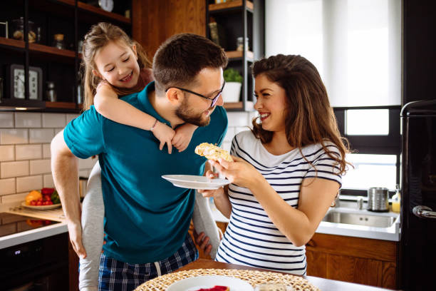 istock Family at home starting their day in the kitchen 1152985507