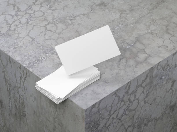 istock White Business Cards Mockup on the concrete cube 1152985859