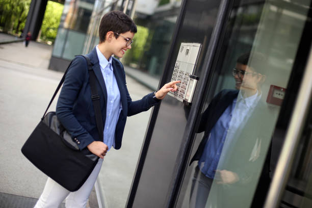istock Businesswoman getting into a building 1152987665