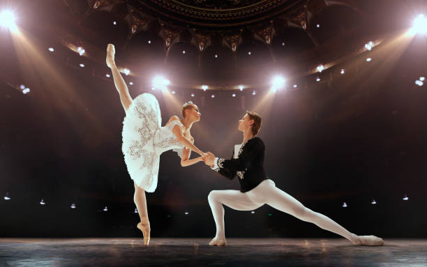 Ballet Ballet. Classical ballet performed by a couple of ballet dancers on the stage of the opera house. flat shoe photos stock pictures, royalty-free photos & images
