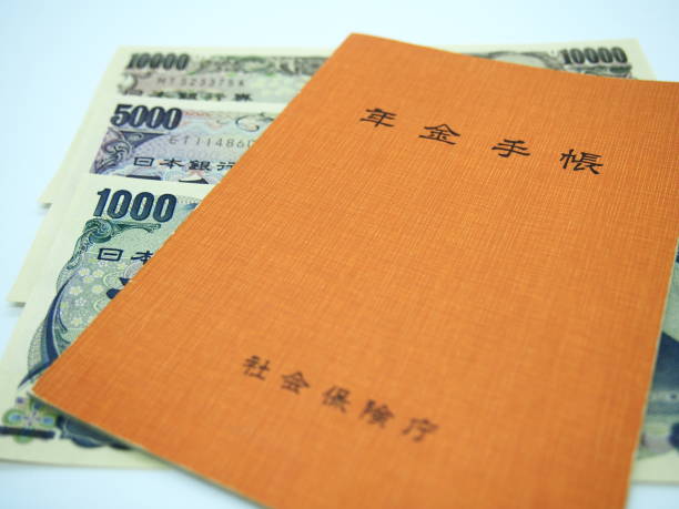 istock Pension handbook and 3 bills 2 1152998045
