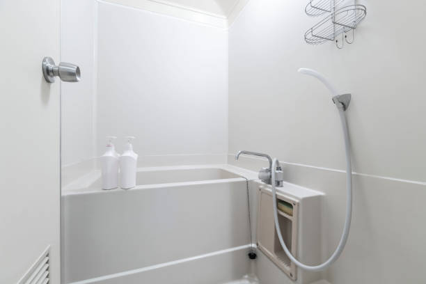 istock Small white bathtub in the white bathroom 1153002480