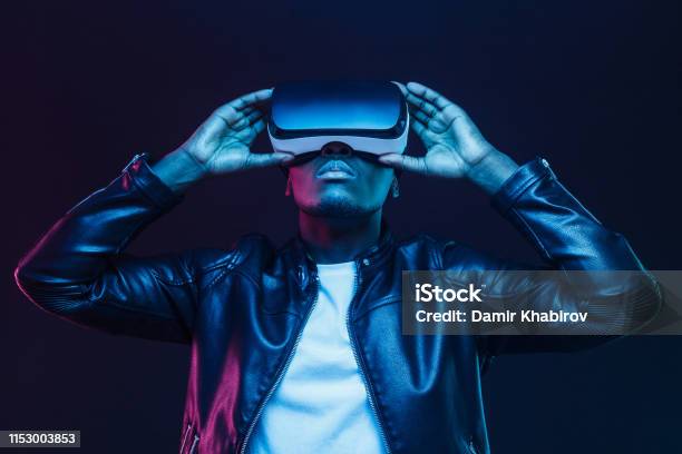 African American Man In Vr Glasses Watching 360 Degree Video With Virtual Reality Headset Isolated On Black Background Stock Photo - Download Image Now