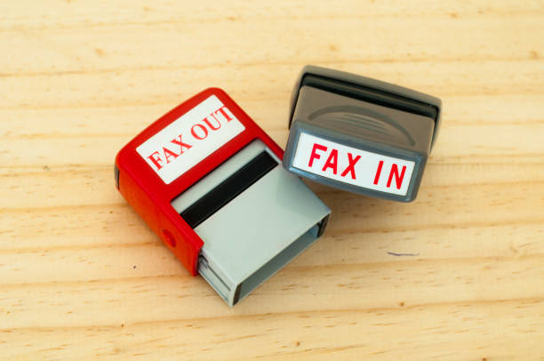 istock Fax in Fax out rubber stamper 1153003985