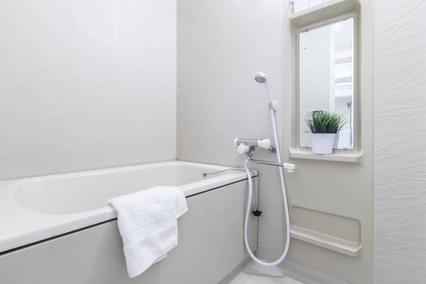 Large white bathtub in new modern bathroom