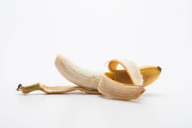 istock Peeled banana on a white background 1153006611