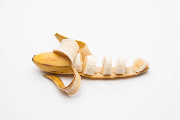 istock Open ripe banana with slice 1153006674