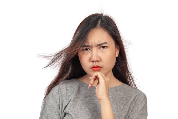istock young woman in action thinking or get some idea . 1153007174