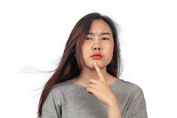 istock young woman in action thinking or get some idea . 1153007181