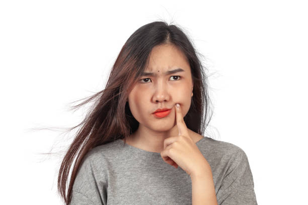 istock young woman in action thinking or get some idea . 1153007202