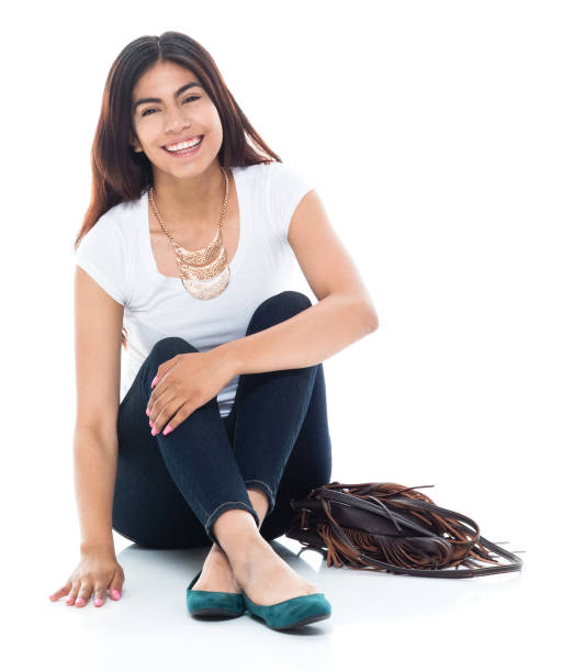 istock Cute female sitting on the ground 1153011671