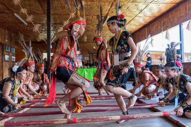 Sabah Borneo Magunatip bamboo dancing performance stock photo