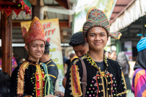 Malaysian Borneo Native Kota Kinabalu, Malaysia - May 31, 2019: Kadazan Dusun borneo native with traditional attire during state level Harvest Festival in KDCA, Kota Kinabalu, Sabah Malaysia. kadazan people stock pictures, royalty-free photos & images