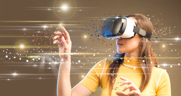 istock Digital screen with young woman with virtual reality glasses 1153018597