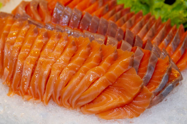 istock Salmon raw sashimi on ice Japanese traditional dish Closed up. 1153019643