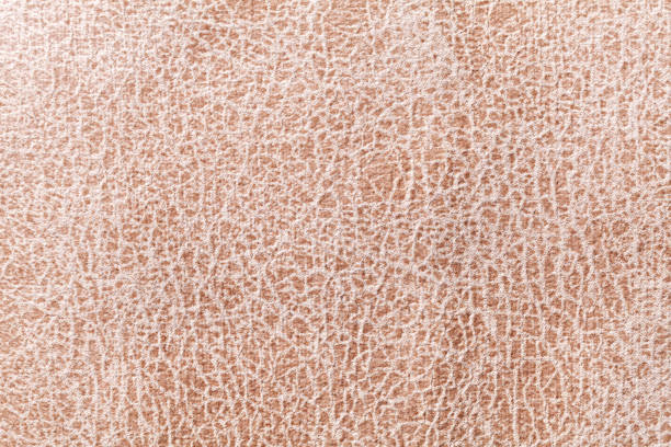 istock Brown background from a soft upholstery textile material, closeup. 1153020668