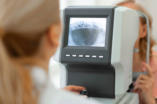 istock Attentive professional therapist observing eye up close on a computer screen 1153021735