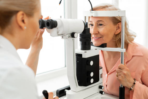 istock Pleasant short-haired woman with blue eyes having her eyes checked 1153021742