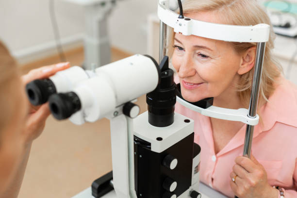 istock Senior good-looking woman visiting ophthalmologist and checking her eyesight 1153021744