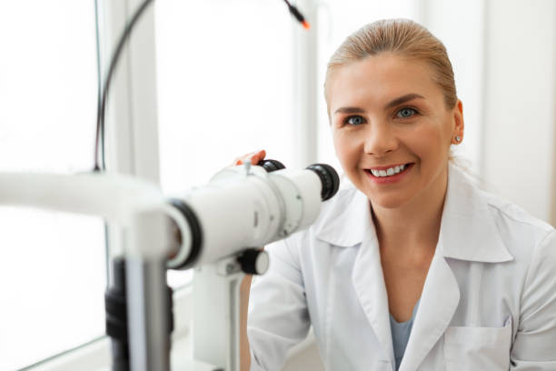istock Positive good-looking ophthalmologist being in great mood during her shift 1153021867