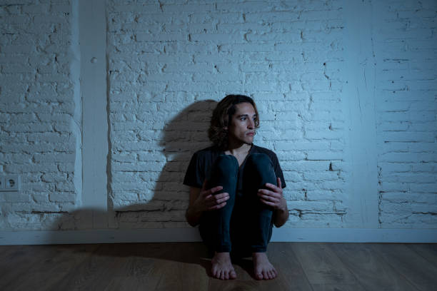 istock Devastated depressed millennial man crying sad feeling hurt suffering Depression. Teenager victim of bullying feeling lonely and depressed alone at home. Emotional pain Loneliness and Heartbroken. 1153024127