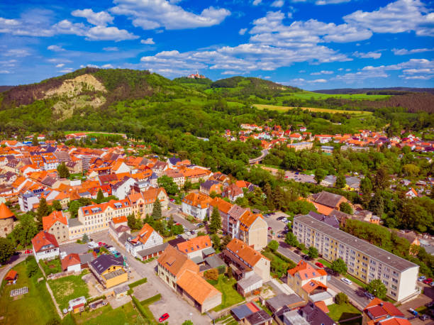 istock City Kahla in Thuringia Germany with forest and mountains 1153025161