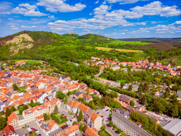istock City Kahla in Thuringia Germany with forest and mountains 1153025338