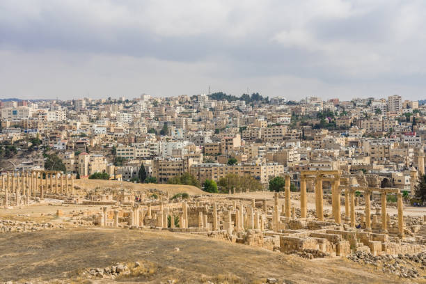 istock Ancient Roman ruins, walkway along the columns in Jerash, Jordan 1153025547