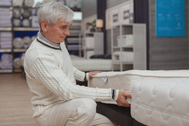 istock Senior man shopping at department store 1153029103