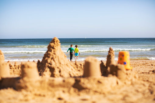 Kids building sand castle