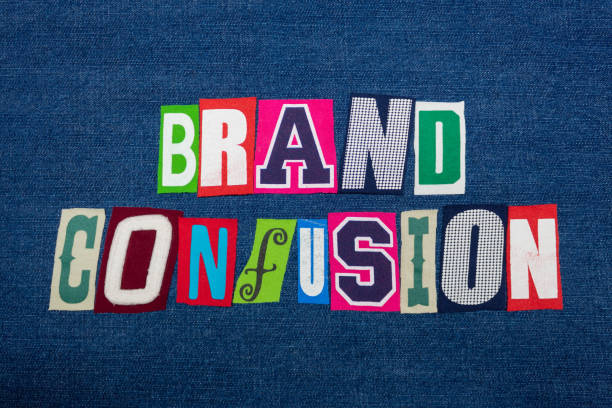brand confusion collage di parole di testo, tessuto colorato su denim blu, incoerenza di marketing - inconclusive foto e immagini stock