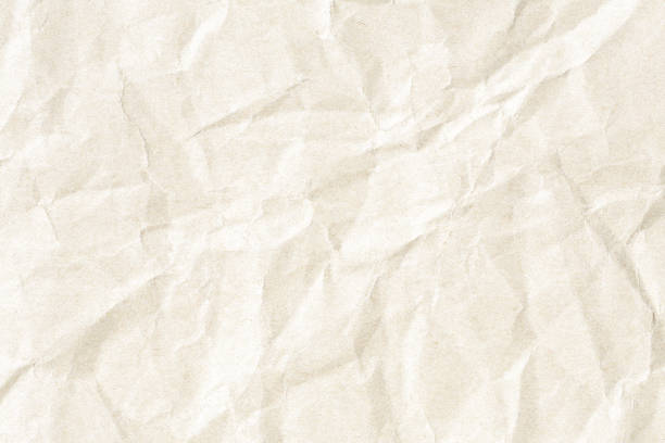 istock Old brown crumpled paper background texture 1153032883