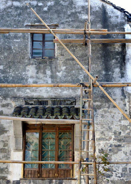 Construction of a house with the help of bamboo scaffolding, Tongli, China