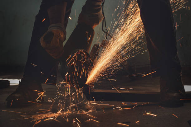 istock Person cutting metal with an angle grinder 1153033874