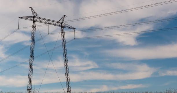 istock cloudy morning sky and a high-voltage line 1153034593