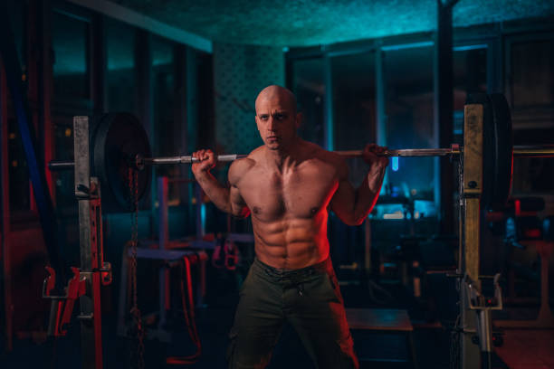 istock Strongman exercising with barbell 1153035946