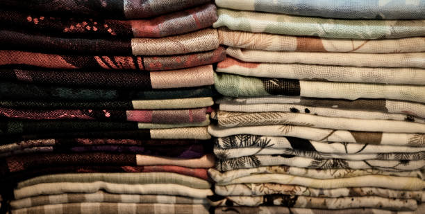 istock colorful towels, diaper, folded textiles, cloth as a background 1153036150