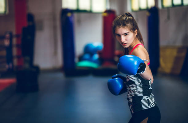 istock Pretty girl boxing 1153038682