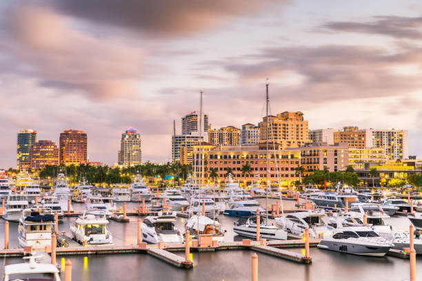 West Palm Beach, Florida, USA Skyline West Palm Beach, Florida, USA downtown skyline at dusk. west palm beach stock pictures, royalty-free photos & images