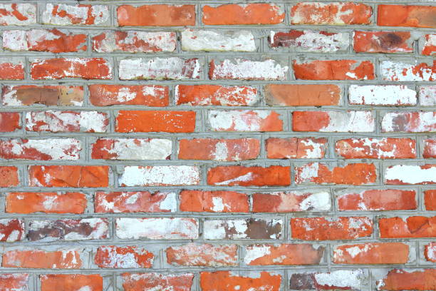istock wall of bright old red brick as beautiful loft-style background for modern interior design 1153039791