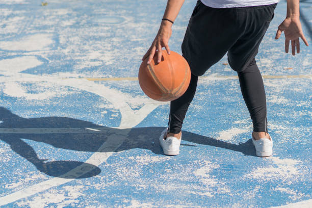 istock Basketball player practicing court in his town 1153040886