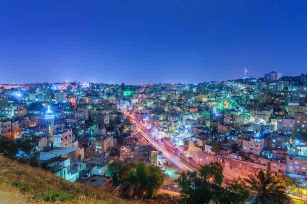 Cityscape Amman downtown at dusk, Panoramic view from the citadel hill. Capital of Jordan. AMMAN, JORDAN - OCTOBER 15, 2018: Cityscape Amman downtown at dusk, Panoramic view from the citadel hill. Capital of Jordan. amman pictures stock pictures, royalty-free photos & images