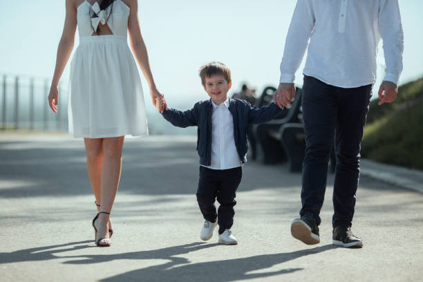 istock Happy young family having fun outside in nature 1153043824