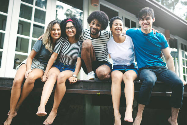 istock Group of good friends having fun together outdoors in the backyard 1153045211