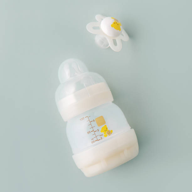 istock Baby goods on light pastel background 1153046176
