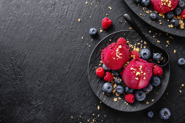 istock Berry refreshing ice cream scoops on plate 1153046217