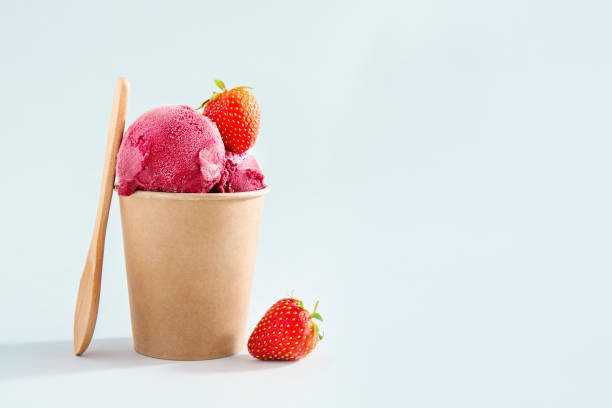 istock Berry refreshing ice cream scoops in paper cup 1153046232